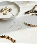 20 Pack Stainless Steel Spring Cotter Pins With Quick Lock For Industrial Machinery And Aerospace Plus Lawn Hitch And Farm Equipment Heavy Duty Safety Fasteners That Hold Tight, displayed with jewelry tools.