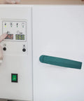Heavy Duty Commercial Oven Handle For Industrial Baking Equipment With Sleek Stylish Design, green vacuum grip on white oven door.