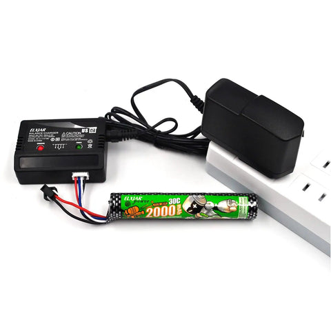 2-Pack Beefed-Up 11.1V 2000mAh Li-Ion Battery Pack With 30C Discharge For RC Cars Boats Drones And Hobby Shooting Devices Includes SM-2P Plug And Balance Charger next to charger and outlet