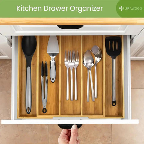 Expandable Bamboo Kitchen Drawer Organizer For Utensils And Flatware, 3 To 5 Slots, showing organized cutlery in a drawer.