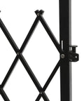 Close-up view of the Badass Expandable Folding Security Gate 51 By 36 Inch Black Rugged Steel Diamond Grid Door with locking mechanism.