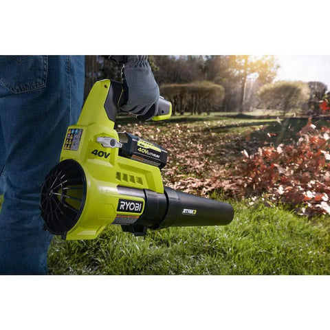 Heavy Duty Cordless Leaf Blower Pumping 110 Mph And 525 CFM With Variable Speed Settings for fast yard cleanup in use.