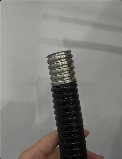 Heavy Duty Flexible Metal Conduit Tough As Nails Black Pvc Covered Corrugated Cable Sleeve Rock Solid Wire Guard close-up view.