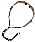 Hardcore Camo Frame Safety Glasses With Bronze Tint Contrast Lenses featuring a flexible wrap-around design and adjustable strap.