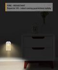 Glare Free Plug In LED Night Light With Dusk To Dawn Sensor next to bedside table, glow illuminating wall, fire resistant feature