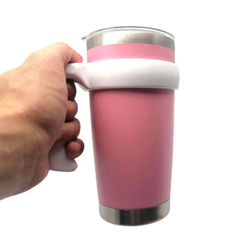 Hand holding pink mug with Anti Slip 20 Oz Tumbler Handle With Comfy Grip For Vacuum Insulated Travel Mugs Fits Yeti Rambler Ozark Trail.
