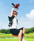 Child enjoying Zip Line Kit For Home Use With Stainless Steel Cable And Iron Trolley Up To 330 Lbs in a backyard.
