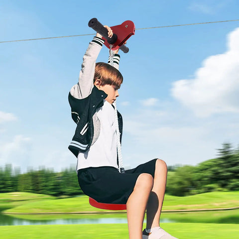 Child enjoying Zip Line Kit For Home Use With Stainless Steel Cable And Iron Trolley Up To 330 Lbs in a backyard.