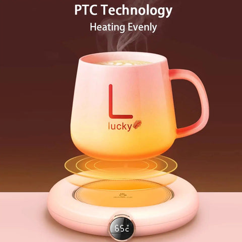 Keep Your Daily Brew Piping Hot On This Stylish Electric Coffee Mug Warmer Offering Three Custom Heat Levels Plus An Eight Hour Auto Shut Off Feature Tailored For Chill Home Or Hustling Office Environments. Pink mug on warmer displaying steam and 65°C.
