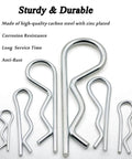 Close-up of zinc plated R clips from 60 Pc Cotter Pin Hair Pin Kit With Zinc Plated R Clips For Hitch Pin Lock Systems In Automotive Marine Tractors Mowers Carts And Trucks Includes 12 Sizes And 2 Styles Durable Carbon Steel Fasteners.