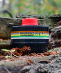 40mm Replacement Filter Canister With Activated Carbon For Respirators in woodland setting with product details visible.