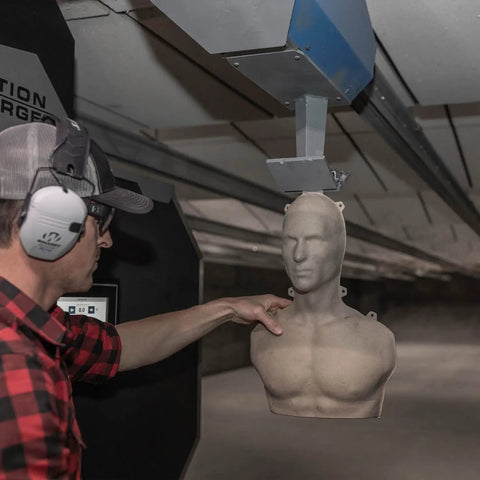 Person adjusting 3D Silhouette Targets 21.5 By 14 Inches With Lightweight Face And Torso Design For Shooting Practice And Training