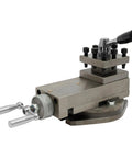 Universal AT300 Lathe Tool Post Assembly With 360 Degree Rotatable Tool Table, seen with a handle and mounting bolts.