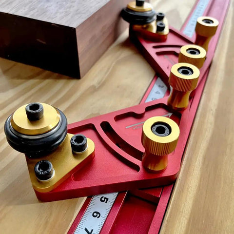 Pro Grade Portable Aluminum Table Saw Roller Feeder Dolly Featuring Smooth Ball Bearings on a wooden surface with measuring scale.