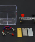 Hands-On Galvanic Cell Experiment Kit For Chemistry Learning with electrodes, wires, and container on black background.