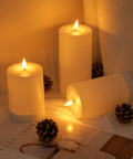 Solar Candles Outdoor Waterproof Flameless Pillar LED Lights Set Of 3 with flickering effect placed on a table
