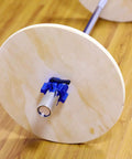 Wood Bumper Plates For Weight Lifting And Rehab Training Easy To Disassemble And Assemble Lightweight Natural Wood For Home Gym Setup And Strength Training Gear For Real Gains Everyday, showing close-up of natural wood finish in a home gym.