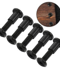 Top Shelf Five Piece Pack Of Black Stainless Steel Binding Screws And Nuts For Scrapbooks Photo Albums And Bookbinding With Countersunk Flat Head For No Sweat Setup on a wooden background.