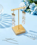 Real 14K Gold Plated Brass Pins Set Dope 180 Pcs 9 Styles Eye Pins Ball Head Pins Flat Head Pins 24 Gauge Eye Pins 23 Gauge Flat Pins For DIY Jewelry Making Earring And Bracelet Crafter Kit displayed with finished earrings