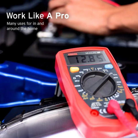 Must Have Digital Multimeter For Home And Auto Use, AC DC Voltage Tester with red casing on a car engine