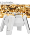 Solar Powered Jewelry Display Stand With 360 Degree Rotating Turntable And Blue LED Lights Electric Base positioned on a background of gold jewelry.