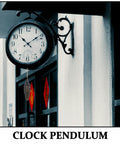Outdoor wall clock with pendulum on ornate bracket, next to building entrance