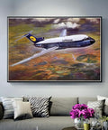 Framed airplane art above sofa in living room decor