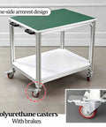 Heavy Hitting Antistatic Workbench With Easy Roll Caster Wheels, features a green top and white shelves with durable aluminum frame.