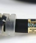 Close-up of 50 Ft Heavy Duty L14-30 Generator Extension Cord UL label and lighted plug for extreme cold to -58F use