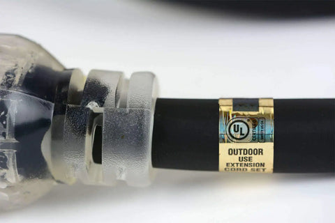 Close-up of 50 Ft Heavy Duty L14-30 Generator Extension Cord UL label and lighted plug for extreme cold to -58F use