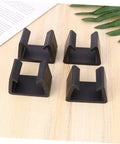 Four Pack Sturdy Chair Clips For Rattan Furniture, Sofa Fasteners And Corner Connectors on wooden surface