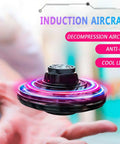 Dope Mini Drone Flying Spinner Boomerang Toy With LED Lights hovering in a hand, colorful LED glow, handheld gyro design