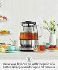 Tea Maker Infuser And Water Kettle 51 Oz Capacity With Programmable One Touch Controls And Auto Tea Basket next to tea set