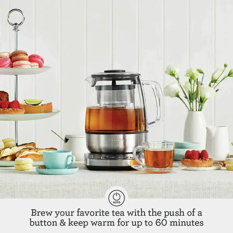Tea Maker Infuser And Water Kettle 51 Oz Capacity With Programmable One Touch Controls And Auto Tea Basket next to tea set