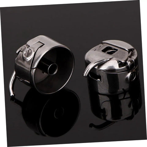 Two Piece Bobbin Case Set For Sewing Machines, Handy Replacement For Old Or Broken Cases on black background