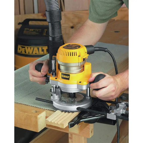 Beefy 2 1/4 Hp Plunge Router Kit With Sturdy Fixed Base And Electronic Variable Speed Control on workbench for precise routing.