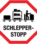 Cool Vintage Tugger Stop Sign With Sleek Octagon Shape And Bold German Metal Tin Design Perfect For Industrial Warehouses Or Commercial Garages This Durable 12 Inch Warning Plaque Adds A Retro Rock Vibes Decor While Keeping Heavy Machinery Areas Safe And, featuring an octagonal shape with a person pushing a cart of goods.