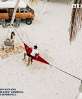 Atlas XL Hammock Suspension System with Wide Tree Straps for Tree Protection in use on sandy beach, easy no knots setup.