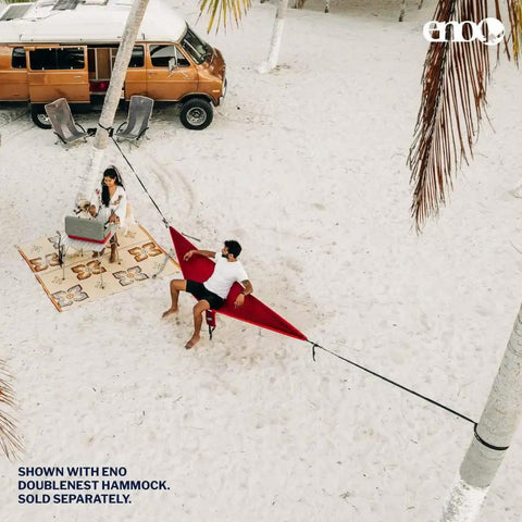 Atlas XL Hammock Suspension System with Wide Tree Straps for Tree Protection in use on sandy beach, easy no knots setup.