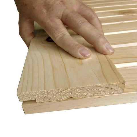 Close-up of Unfinished Interior Barn Door Slab DIY Kit With Solid Pine Core, showing edge detail and knotty pine grain.