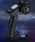 Turbo Racing P32 91803GC 2.4G 4CH RC Remote And Receiver Controller with LCD Display and waterproof radio transmitter visible.