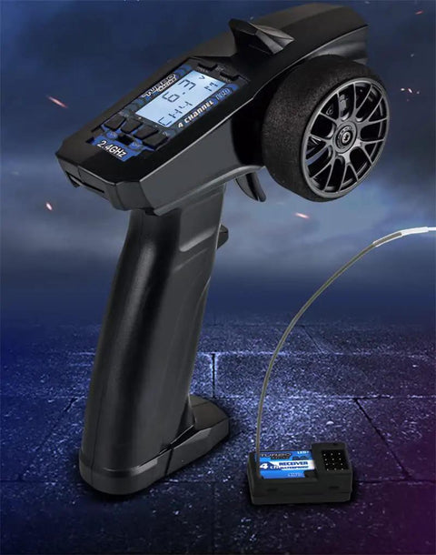 Turbo Racing P32 91803GC 2.4G 4CH RC Remote And Receiver Controller with LCD Display and waterproof radio transmitter visible.