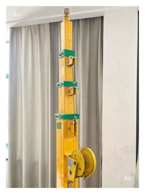 Manual Crank Telescopic Light Pole with yellow finish, solid build and self-locking winch for smooth gear lifting.