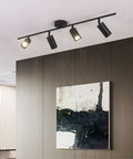 Four Light Black Track Lighting Kit With Flexible Heads Dimmable LED Indoor Ceiling Spotlight installed in modern room setting