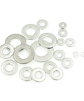 Close-up of assorted SAE stainless steel flat washers (304/18-8) in multiple sizes for screws and bolts.