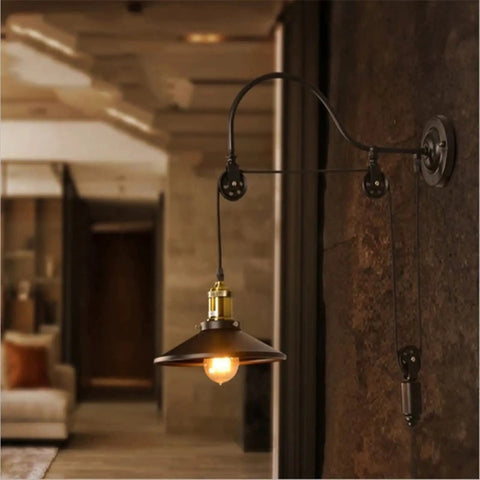 Dope Vintage Wall Sconce Featuring Classic Wrought Iron Build With Handsome Pulley Adjustment For Slick Loft Rooms And Chill Bar Decor That Seriously Slays And Looks Absolutely Lit, showcasing a movable pulley and globe shade.