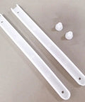 Sturdy Stainless Steel Drawer Slide Rail Set With White Plastic Glides, two white glides and caps on neutral background