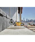 Flexvolt 9 Inch Diamond Cutting Wheel For Masonry And Concrete With Seven Eighths Inch Arbor 6600 Max RPM in use at construction site