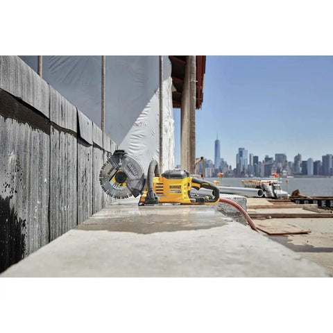 Flexvolt 9 Inch Diamond Cutting Wheel For Masonry And Concrete With Seven Eighths Inch Arbor 6600 Max RPM in use at construction site