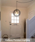 Plug In Industrial Pendant Light With Rotatable Cage in hallway, black and gold style metal fixture, E26 base, entryway use.